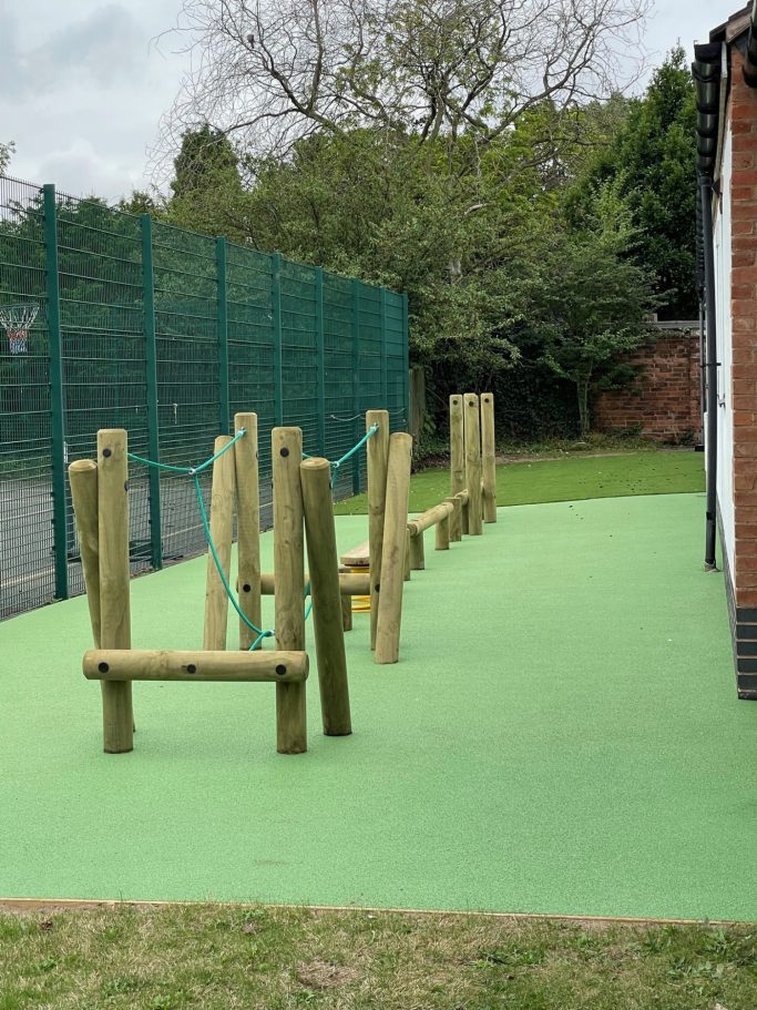 Timber Obstacle Course with Green Safety Surfacing