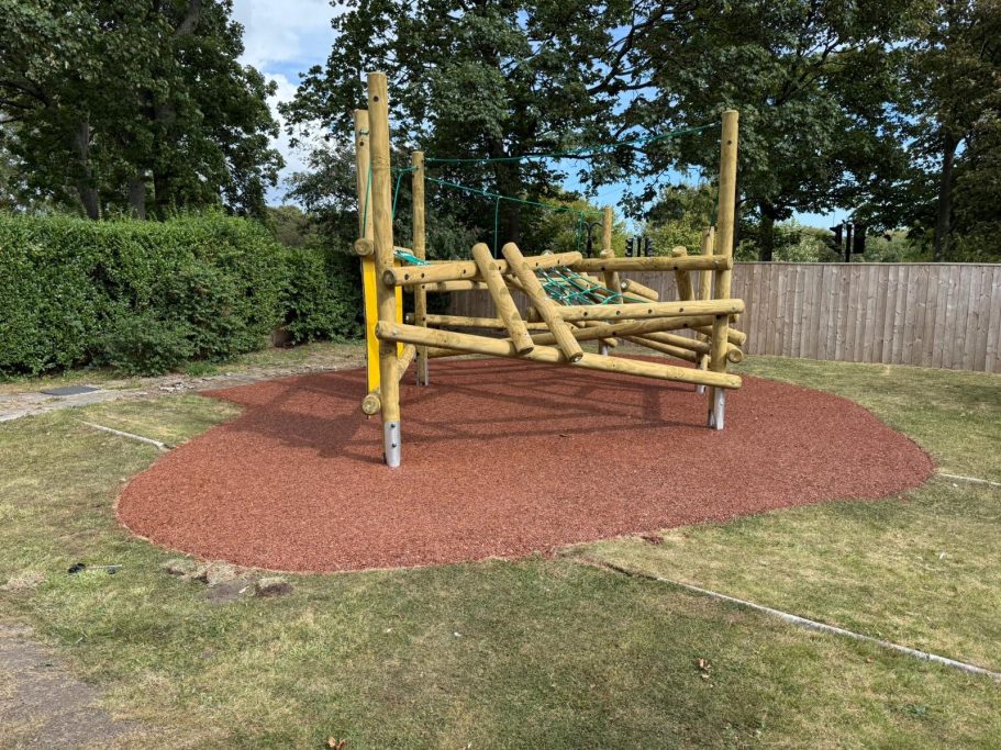 Timber Climbing Frame with Red Pour Surface